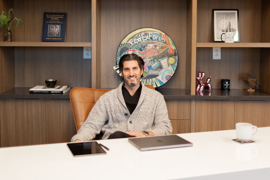 Dr. Nicholas Karter sitting at his desk.